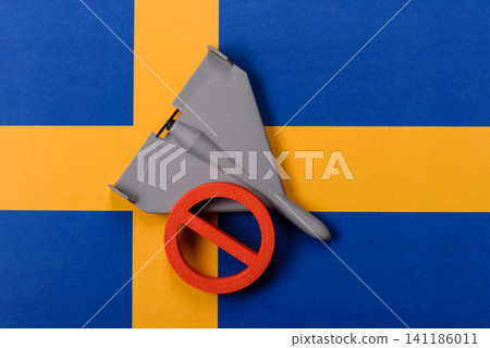 A Shahed drone featuring a prohibition symbol on the Sweden flag, conceptual background for defense A Shahed drone featuring a prohibition symbol on the Sweden flag, conceptual background for defense 141186011