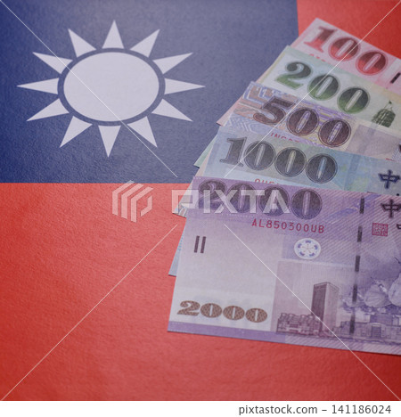 Taiwan, Taiwanese paper banknotes and coins, dollars of various denominations. Taiwanese dollars Taiwan, Taiwanese paper banknotes and coins, dollars of various denominations. Taiwanese dollars 141186024
