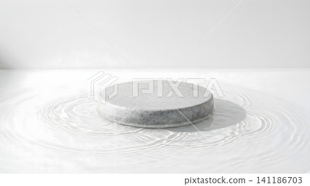 A white object sitting on top of a white surface A white object sitting on top of a white surface 141186703
