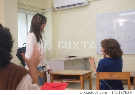 The young children are learning in the classroom. The young children are learning in the classroom. 141187626