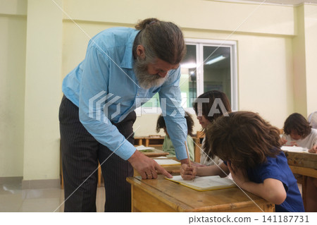 The young children are learning in the classroom. The young children are learning in the classroom. 141187731