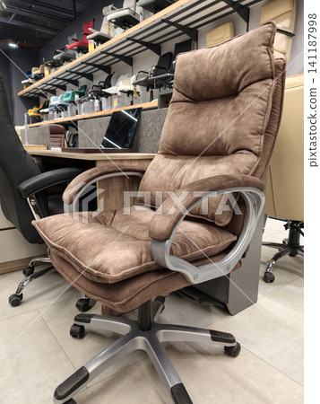 Height-adjustable office chair available at a home goods superstore Height-adjustable office chair available at a home goods superstore 141187998