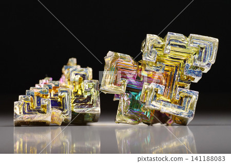 Bismuth crystals. Bismuth - chemical element with symbol Bi and atomic number 83 Bismuth crystals. Bismuth - chemical element with symbol Bi and atomic number 83 141188083