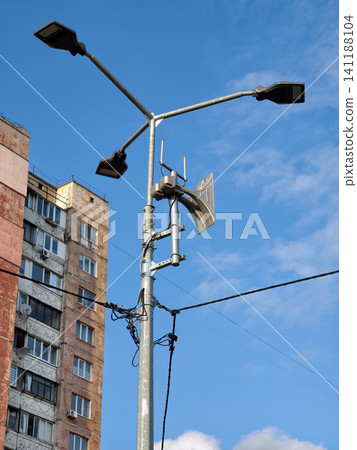 A civil defense air raid siren used in cities, broadcasting warning signals to prepare citizens for aerial bombardment A civil defense air raid siren used in cities, broadcasting warning signals to prepare citizens for aerial bombardment 141188104
