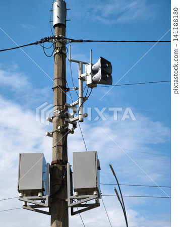 A siren used for air raid alerts, emitting a loud sound to warn civilians about incoming threats A siren used for air raid alerts, emitting a loud sound to warn civilians about incoming threats 141188180