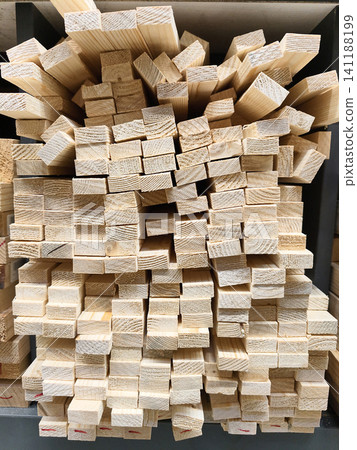 Boards, slats and wooden products presented in building materials section of supermarket Boards, slats and wooden products presented in building materials section of supermarket 141188199