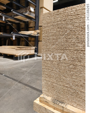 Oriented Strand Board or OSB, construction panel for wall sheathing roofing and other wood product application sold in building supermarket Oriented Strand Board or OSB, construction panel for wall sheathing roofing and other wood product application sold in building supermarket 141188265