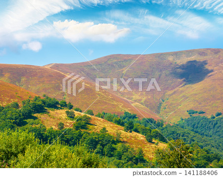 carpathian mountain landscape. travel ukraine in summer. colorful slopes of borzhava mountain ridge in august. wonderful carpathian adventure carpathian mountain landscape. travel ukraine in summer. colorful slopes of borzhava mountain ridge in august. wonderful carpathian adventure 141188406