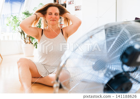 heat fan woman heat fan woman 141188626