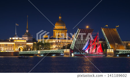 Saint-Petersburg, Russia - June 12, 2026, panoramic view of Neva River with a ship with scarlet sails, with Palace Bridge, St. Isaac's Cathedral, and Admiralty in background, in evening, St Petersburg Saint-Petersburg, Russia - June 12, 2026, panoramic view of Neva River with a ship with scarlet sails, with Palace Bridge, St. Isaac's Cathedral, and Admiralty in background, in evening, St Petersburg 141189602