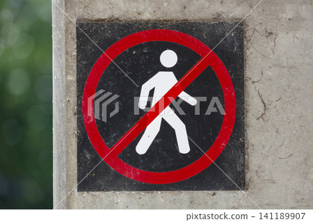 A no walking sign located near a road in Western Sydney A no walking sign located near a road in Western Sydney 141189907