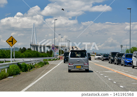 Road and traffic flow towards Shinminato Bridge Road and traffic flow towards Shinminato Bridge 141191568
