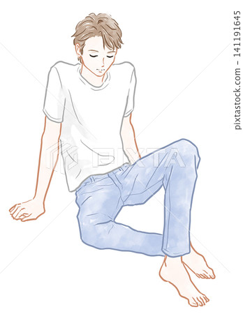 一位男士姿態放鬆地坐著。 一位男士姿態放鬆地坐著。 141191645