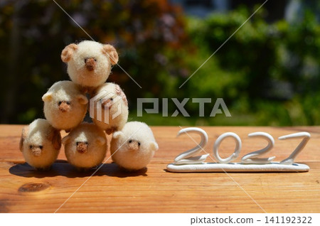 New Year's card design featuring overlapping wool felt sheep New Year's card design featuring overlapping wool felt sheep 141192322