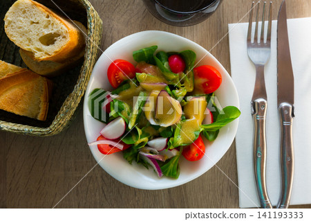 Dietary salad with tomatoes, greens Dietary salad with tomatoes, greens 141193333