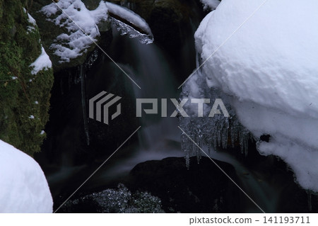 Frozen waterfall Frozen waterfall 141193711