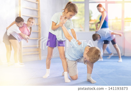 practice grabbing their opponent's arms practice grabbing their opponent's arms 141193873