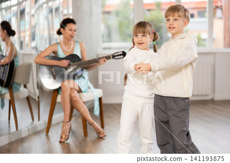 Kids dance class with live guitar music in studio Kids dance class with live guitar music in studio 141193875