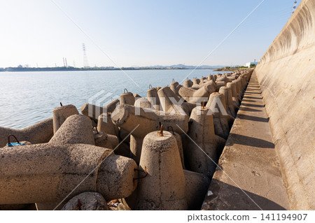A breakwater taller than a person located around the Kakogawa Steelworks 141194907