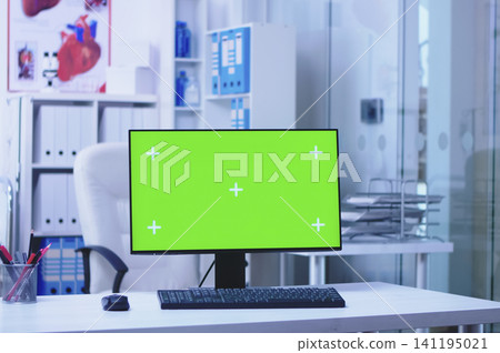 Replaceable computer display in a hospital cabinet, showing nurse movement, glass door activity and editable desktop computer screen space for healthcare technology. Replaceable computer display in a hospital cabinet, showing nurse movement, glass door activity and editable desktop computer screen space for healthcare technology. 141195021
