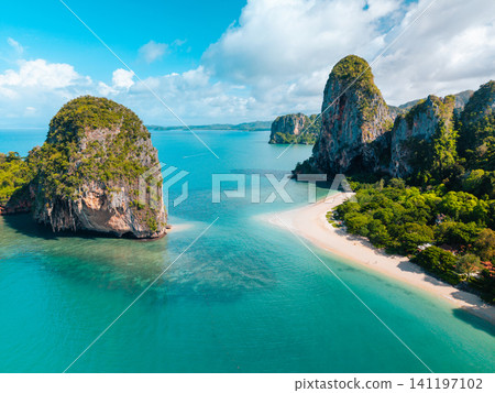 Dramatic limestone cliffs at Phra Nang beach in Krabi from above Dramatic limestone cliffs at Phra Nang beach in Krabi from above 141197102