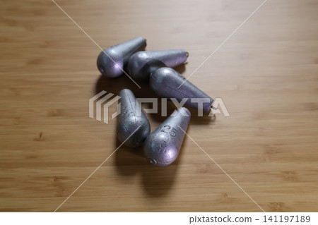 One eggplant-shaped fishing sinker One eggplant-shaped fishing sinker 141197189