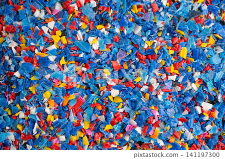 Plastic colorful pieces recycling shredded for industrial use. Plastic colorful pieces recycling shredded for industrial use. 141197300