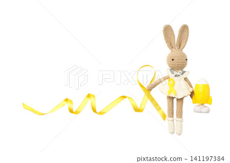 Crochet bunny with yellow ribbon and rocket, isolated on white, PNG Crochet bunny with yellow ribbon and rocket, isolated on white, PNG 141197384
