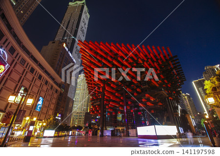 Chongqing cityscape at night with illuminated red sculpture and skyscrapers Chongqing cityscape at night with illuminated red sculpture and skyscrapers 141197598