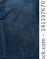 Closeup of a denim pocket showing fabric and stitching details 141197670