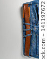 Closeup view of denim jeans with details of pockets and stitching 141197672