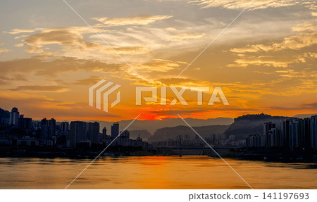 Chongqing city skyline silhouette at sunset over the Yangtze River Chongqing city skyline silhouette at sunset over the Yangtze River 141197693
