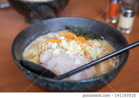 I ate some delicious miso ramen in Sapporo, Hokkaido, Japan. I ate some delicious miso ramen in Sapporo, Hokkaido, Japan. 141197818