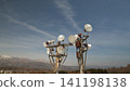 Night lighting installed on a snowy mountain 141198138