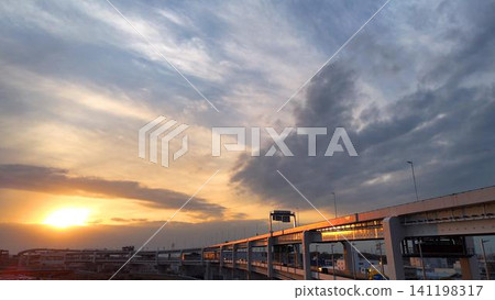 A dynamic elevated bridge and a beautiful sunset sky. A dynamic elevated bridge and a beautiful sunset sky. 141198317
