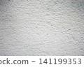 Textured white wall with subtle patterns and shadows 141199353