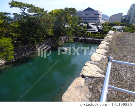 Takamatsu Castle (Tamamo Park) moat and traditional Japanese boats - Takamatsu City, Kagawa Prefecture Takamatsu Castle (Tamamo Park) moat and traditional Japanese boats - Takamatsu City, Kagawa Prefecture 141199820