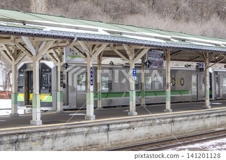 A diesel railcar stopped at Engaru Station. A diesel railcar stopped at Engaru Station. 141201128