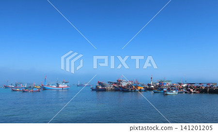 Ly Son Island, a tourist destination in central Vietnam, is known for its blue sea and fishing boats. Ly Son Island, a tourist destination in central Vietnam, is known for its blue sea and fishing boats. 141201205
