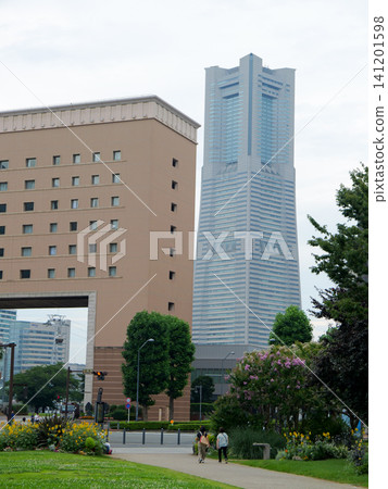 A vertical view of Yokohama Minato Mirai, where modern buildings and greenery harmonize. A vertical view of Yokohama Minato Mirai, where modern buildings and greenery harmonize. 141201598