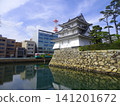 The Ushitora Turret (former Taiko Turret site) at Takamatsu Castle Ruins (Tamamo Castle Ruins/Tamamo Park) and a train of the Takamatsu Kotohira Electric Railway - Takamatsu City, Kagawa Prefecture 141201672