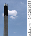 Clouds passing over the clock tower 141201953
