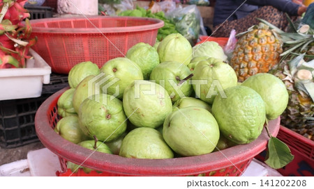 A street market on Ly Son Island, a tourist destination in central Vietnam, featuring guavas. A street market on Ly Son Island, a tourist destination in central Vietnam, featuring guavas. 141202208