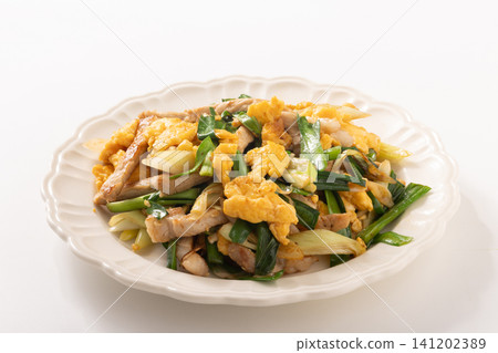 Stir-fried pork and scrambled eggs with wild yam greens Stir-fried pork and scrambled eggs with wild yam greens 141202389