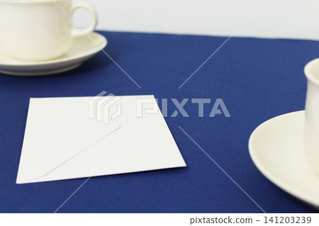 Table image with envelopes and coffee cups [for business and personal use] 141203239