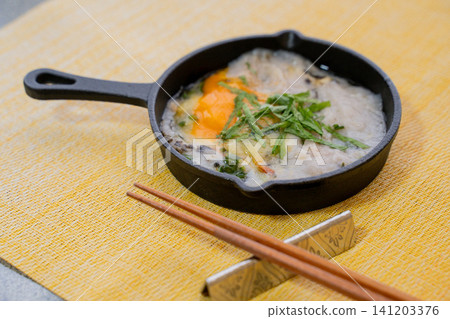 Grilled yam in a skillet Grilled yam in a skillet 141203376