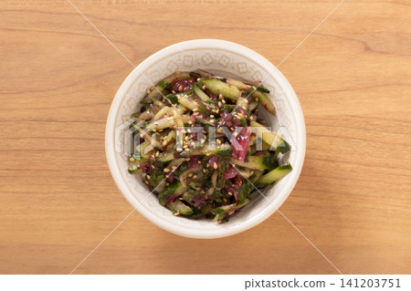 Pickled plum jellyfish, cucumber, seaweed salad Pickled plum jellyfish, cucumber, seaweed salad 141203751