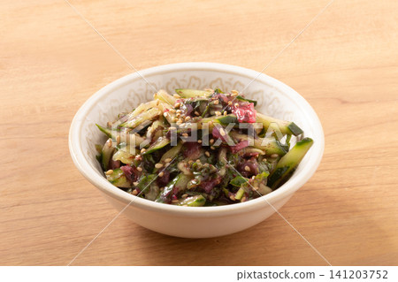 Pickled plum jellyfish, cucumber, seaweed salad Pickled plum jellyfish, cucumber, seaweed salad 141203752