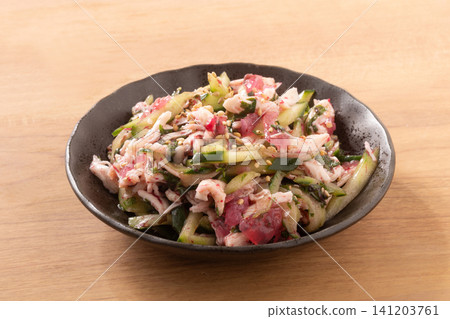 Pickled plum jellyfish, chicken breast, cucumber, and Japanese-style salad. Pickled plum jellyfish, chicken breast, cucumber, and Japanese-style salad. 141203761
