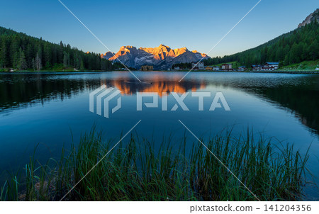 Lake Misurina at sunrise, Dolomite Mountains, Italy Lake Misurina at sunrise, Dolomite Mountains, Italy 141204356